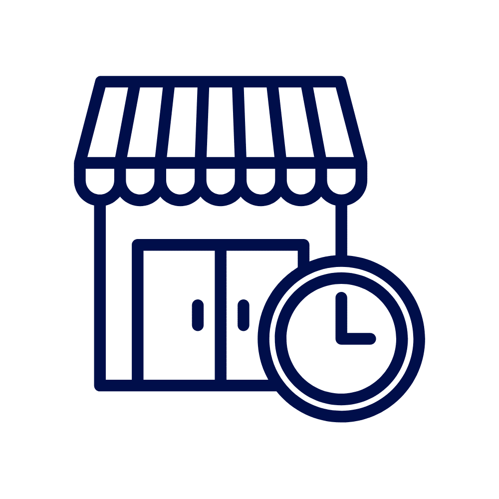 Retail storefront with a clock, symbolizing operating hours or working in a retail environment.